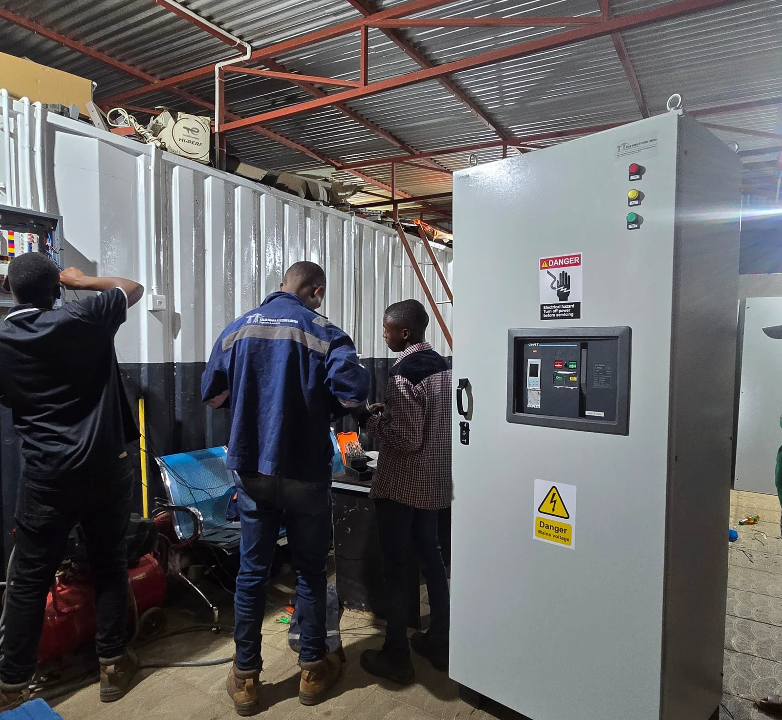 KELM team installing an industrial control panel